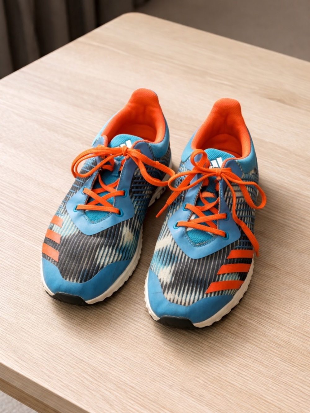 Adidas Supernova Rise 3 Adaptive running shoes.